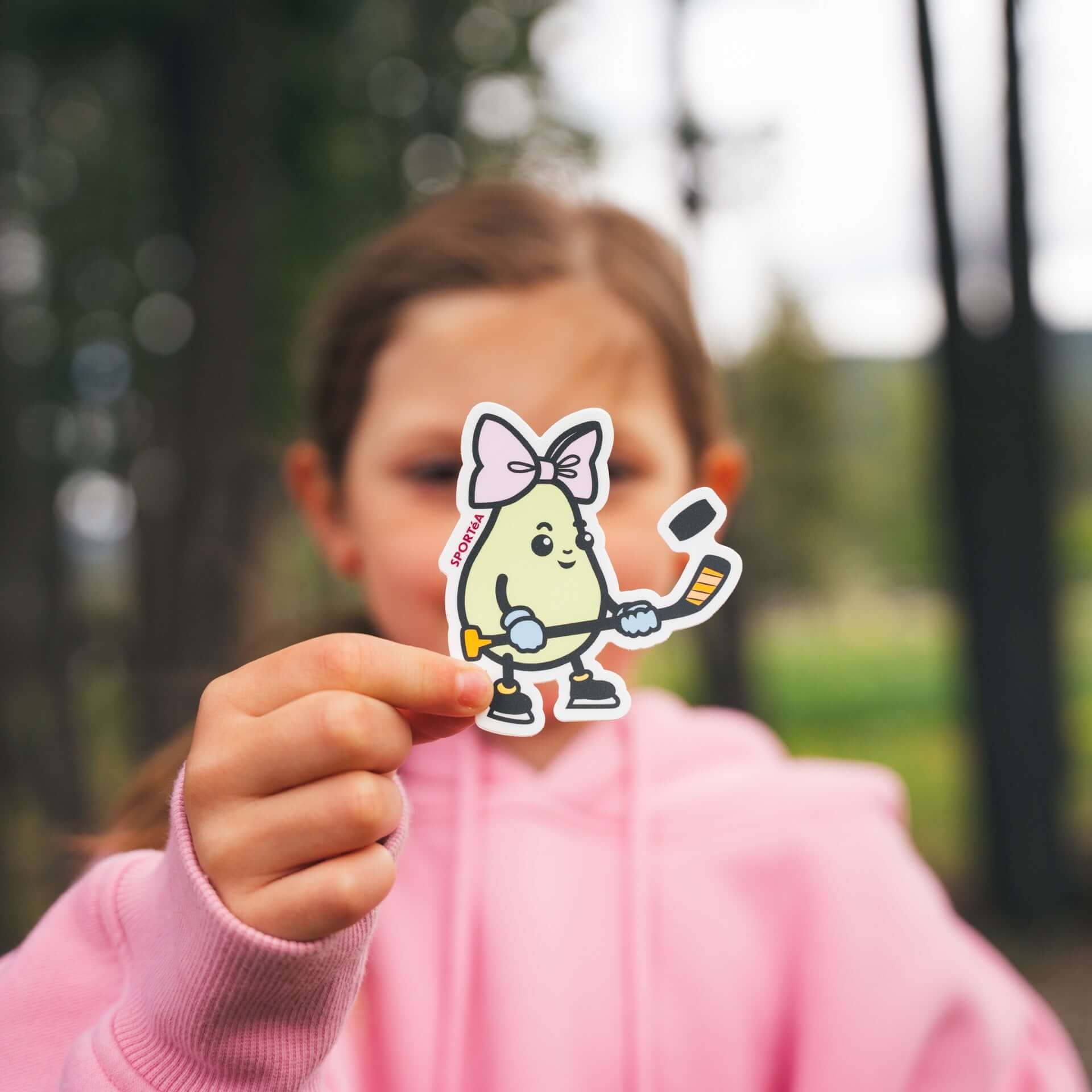 Young Girl holding Hockey Pear Sticker by SPORTéA