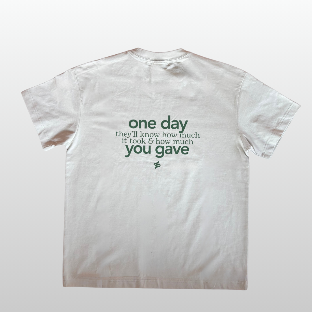 White t-shirt with black text on a white background